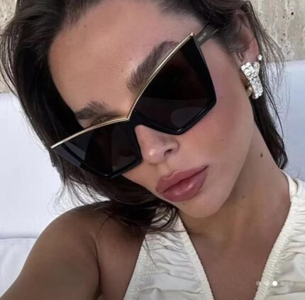 Gafas de sol negras con dorado ojo de gato