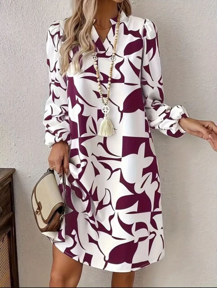 Vestido blanco con estampado ciruela a media pierna y manga larga - Imagen 1