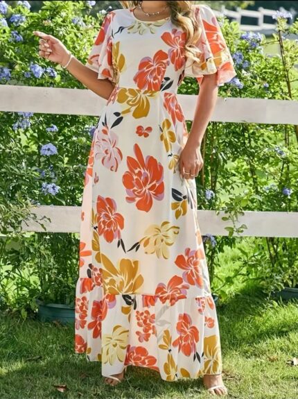 Vestido largo beis de flores con maga murcielago