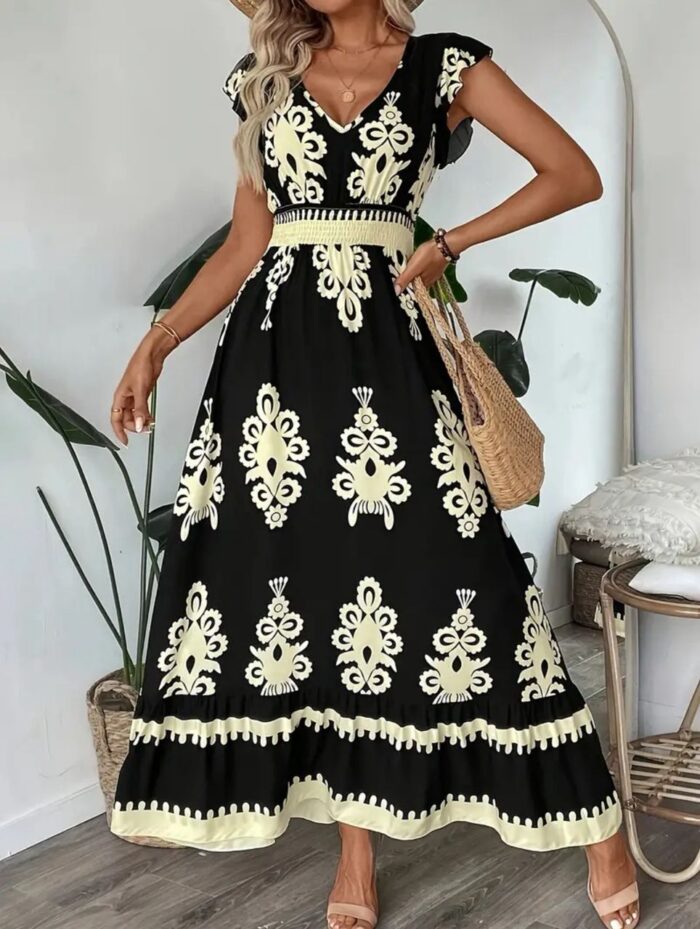 Vestido largo fondo negro y figuras beis cuello V - Imagen 1