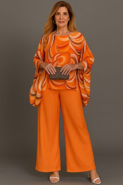 Conjunto de blusa estampada naranja y pantalón unicolor naranja a juego